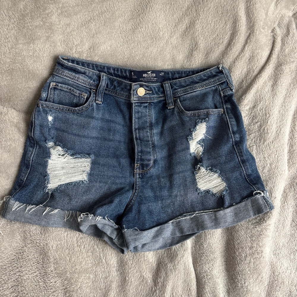 Hollister Blue Distressed Denim Shorts
One slight stain pictured on last slide
